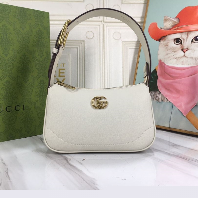G*u*i top handle bags